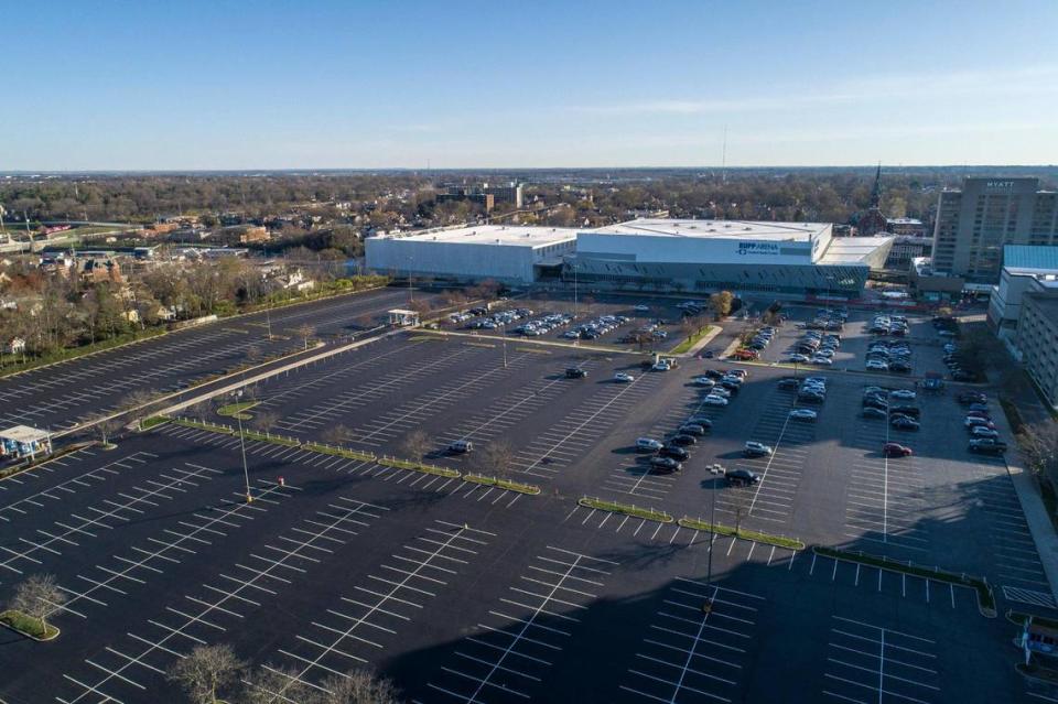 The parking lot across the street from Central Bank Center will be developed into a residential and retail site after a proposal with a local developer was selected Thursday over Lexington Sporting Club’s bid for a downtown soccer stadium.