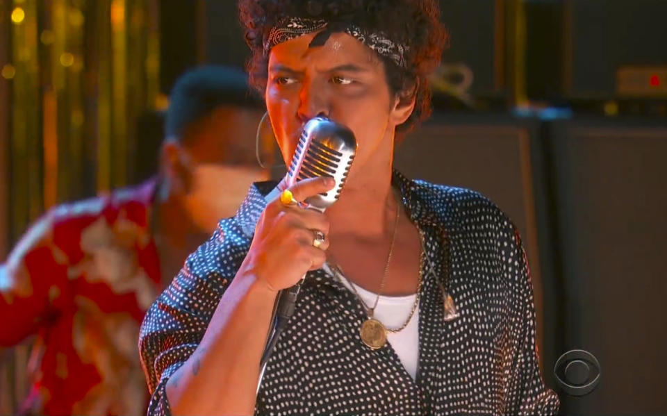 In this video grab provided by CBS and the Recording Academy, Bruno Mars performs "Leave The Door Open"at the 63rd annual Grammy Awards at the Los Angeles Convention Center on Sunday, March 14, 2021. (CBS/Recording Academy via AP)