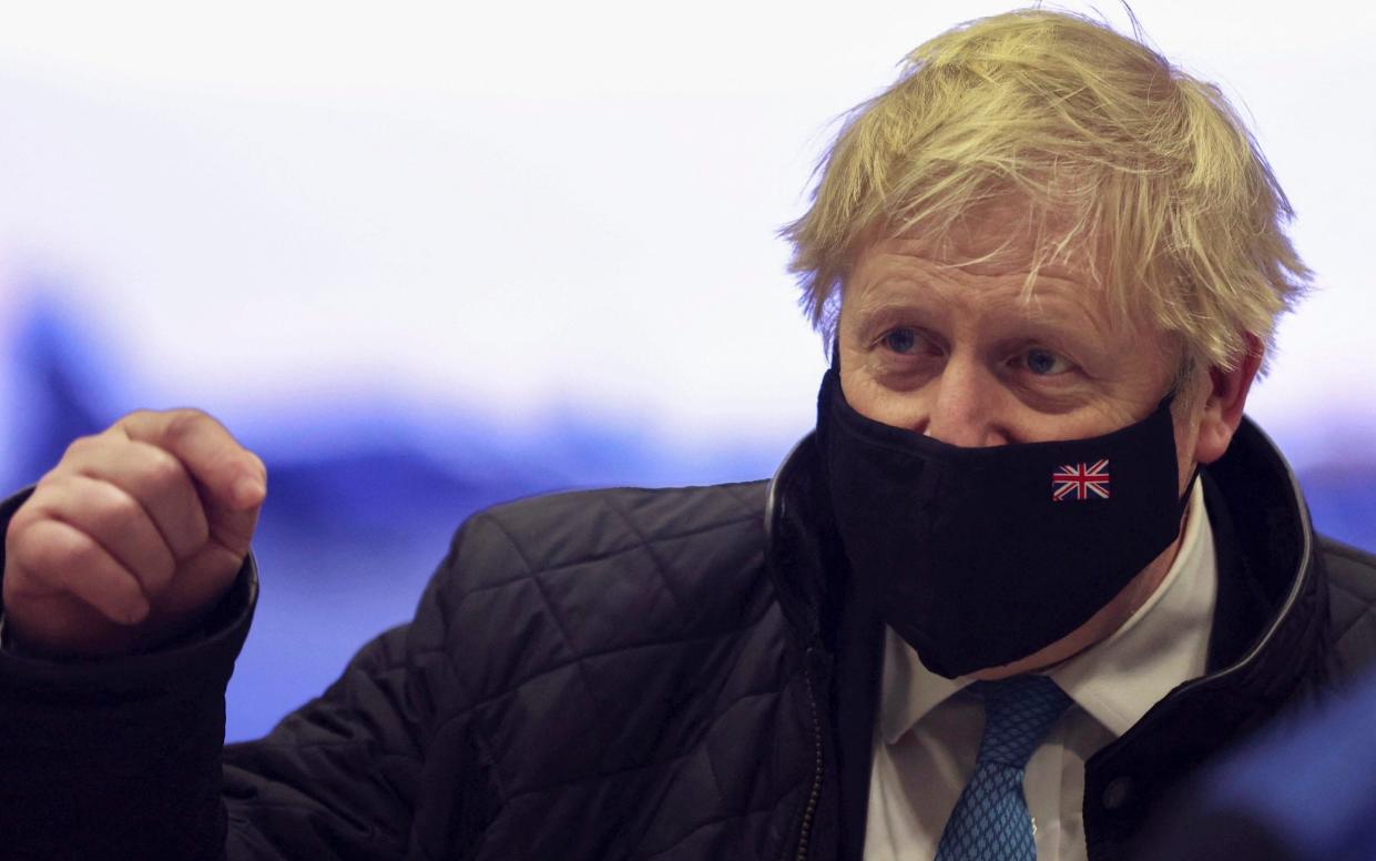 Boris Johnson, pictured in Wales on Thursday, told Conor Burns 'there was no cake' at the gathering - Carl Recine/Pool Photo via AP