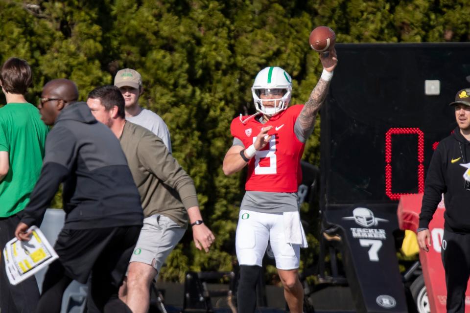 Oregon quarterback Dillon Gabriel throws out a pass during practice with the Oregon Ducks April 9 at the Hatfield-Dowlin Complex in Eugene.