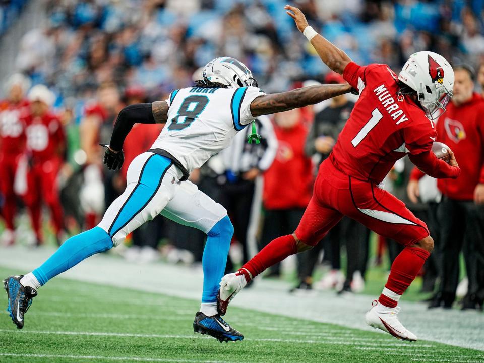 Kyler Murray runs out of bounds against the Carolina Panthers.