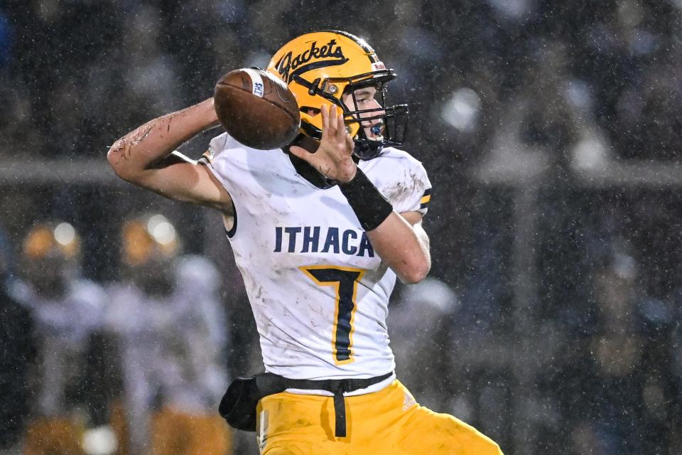 Ithaca's Bronson Bupp looks to pass against Pewamo-Westphalia during the first quarter on Friday, Oct. 29, 2021, at Pewamo-Westphalia High School.