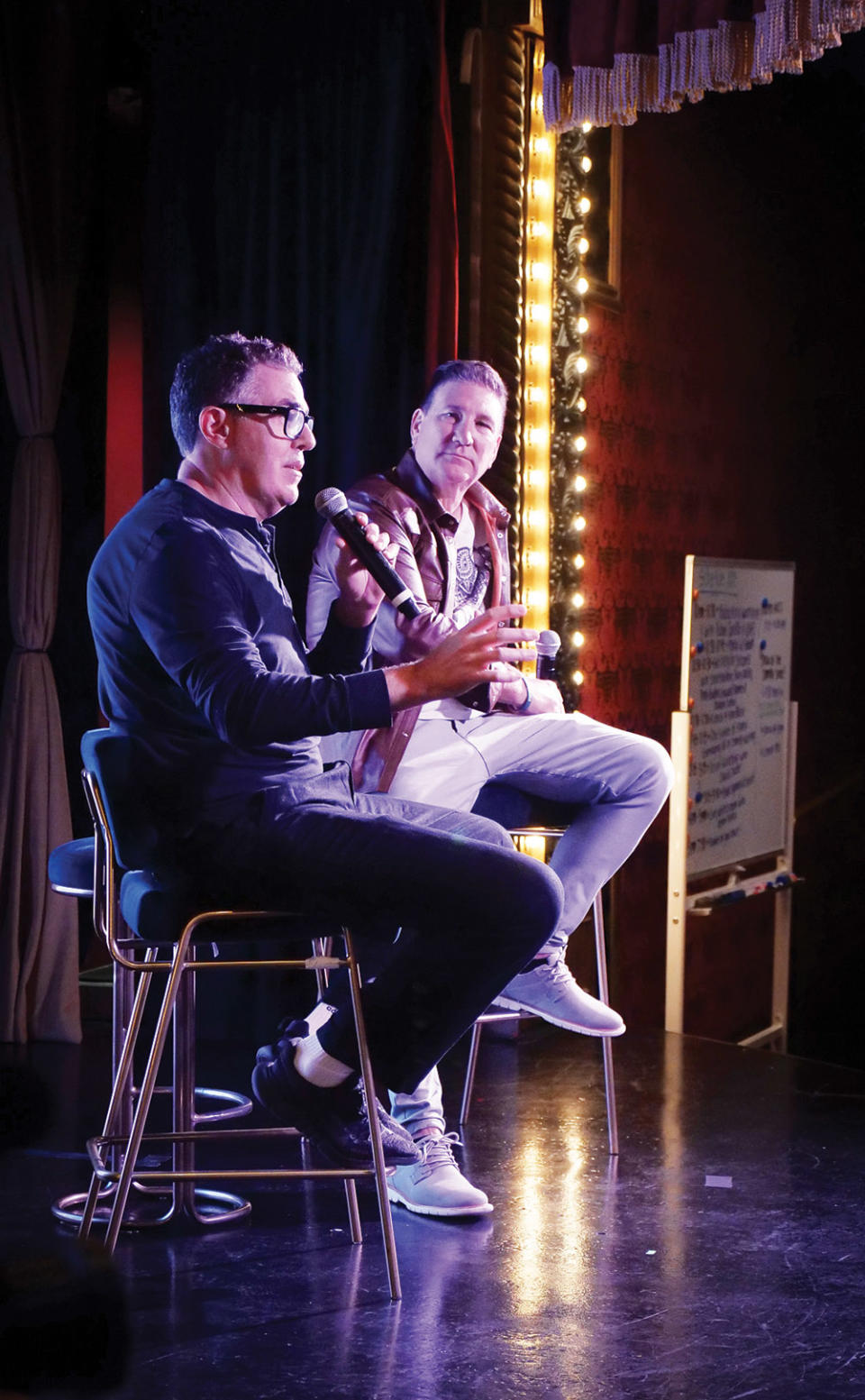 Adam Carolla (left) and camper Mike August