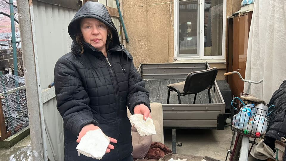 Maria Slisovka stands outside her house near the missile strike in Odesa. - Kostyantyn Hak/CNN