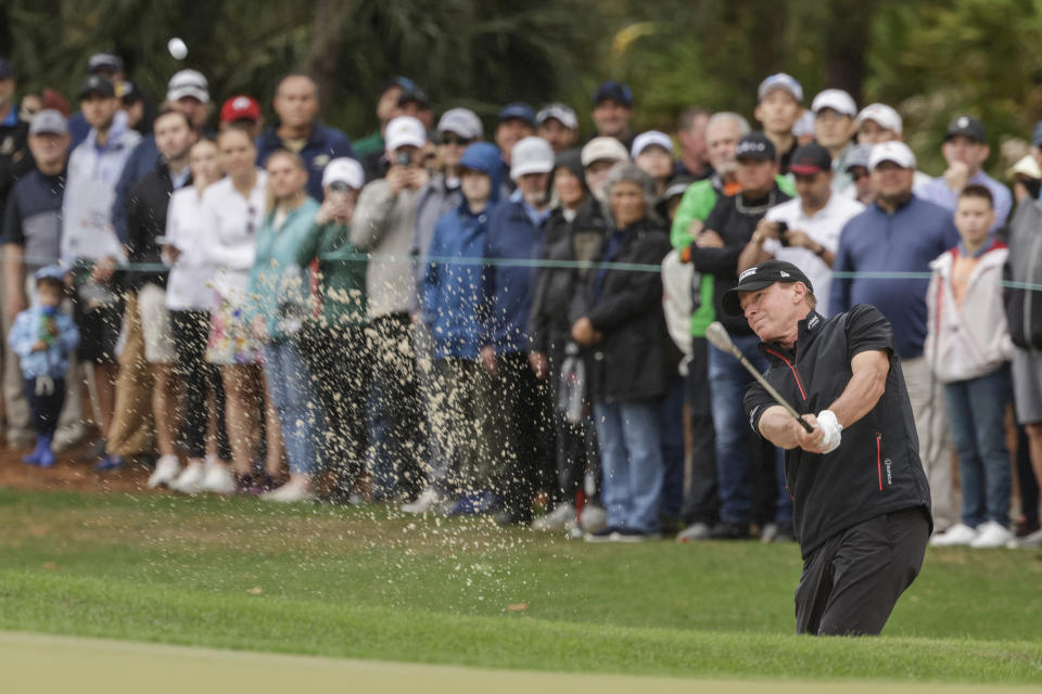 Steve Stricker hits out of sand trap during the final round of the PNC Championship golf tournament Sunday, Dec. 17, 2023, in Orlando, Fla. (AP Photo/Kevin Kolczynski)