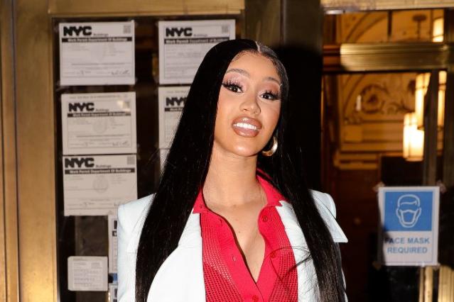 Cardi B Teases Super Bowl Commercial in Blue Lace-Up Dress, Chanel