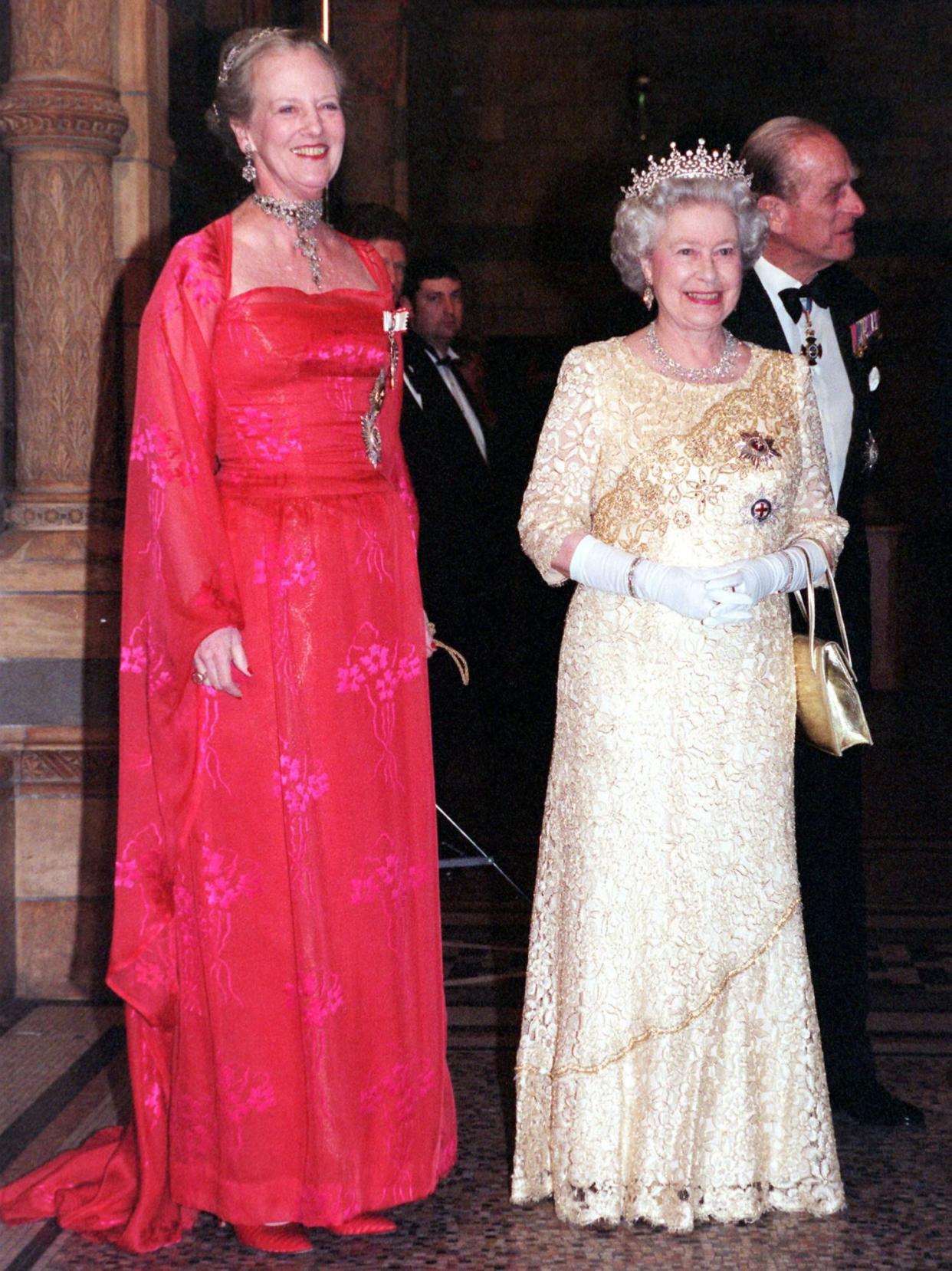 Queen Elizabeth II and Queen Margrethe of Denmark welcome guests at reception hosted by the Danish Queen at The Natural History Museum on February 17, 2000 (Photo by Anwar Hussein/WireImage)