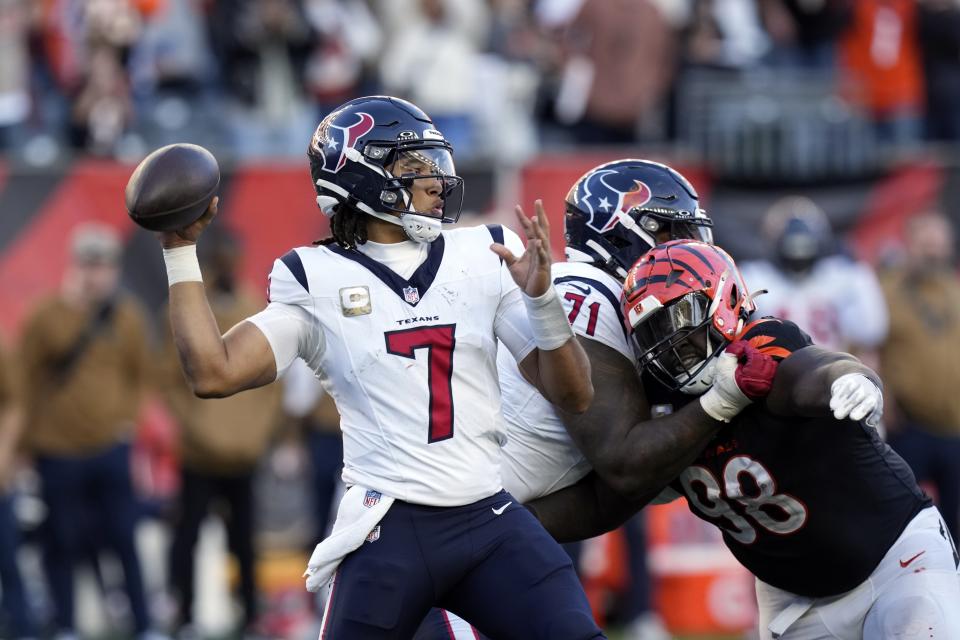 Houston Texans quarterback C.J. Stroud (7) throws a pass against the Cincinnati Bengals during the second half of an NFL football game Sunday, Nov. 12, 2023, in Cincinnati. (AP Photo/Carolyn Kaster)