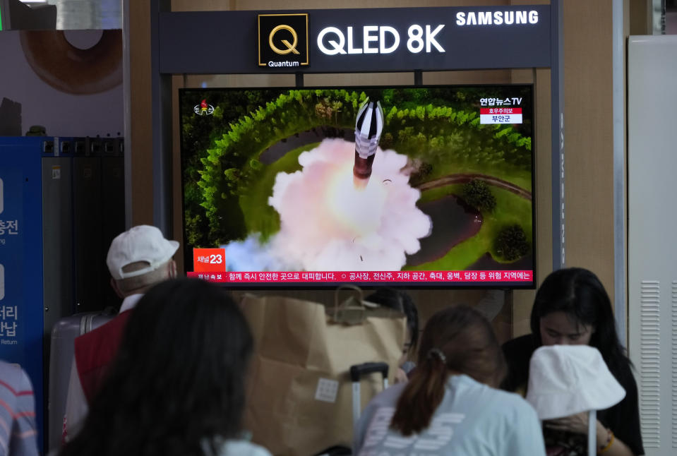 A TV screen shows a file image of North Korea's missile launch during a news program at the Seoul Railway Station in Seoul, South Korea, Tuesday, July 25, 2023. North Korea fired two short-range ballistic missiles into its eastern sea, South Korea's military said Tuesday, adding to a recent streak in weapons testing that is apparently in protest of the U.S. sending major naval assets to South Korea in a show of force. (AP Photo/Ahn Young-joon)