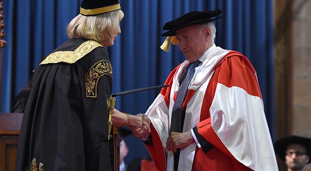 Former Australian Prime Minister John Howard is presented with an Honorary Doctorate by Chancellor Belinda Hutchinson. Photo: AAP