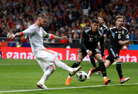 Soccer Football - International Friendly - Spain vs Argentina - Wanda Metropolitano, Madrid, Spain - March 27, 2018 Spain's Sergio Ramos shoots at goal REUTERS/Juan Medina