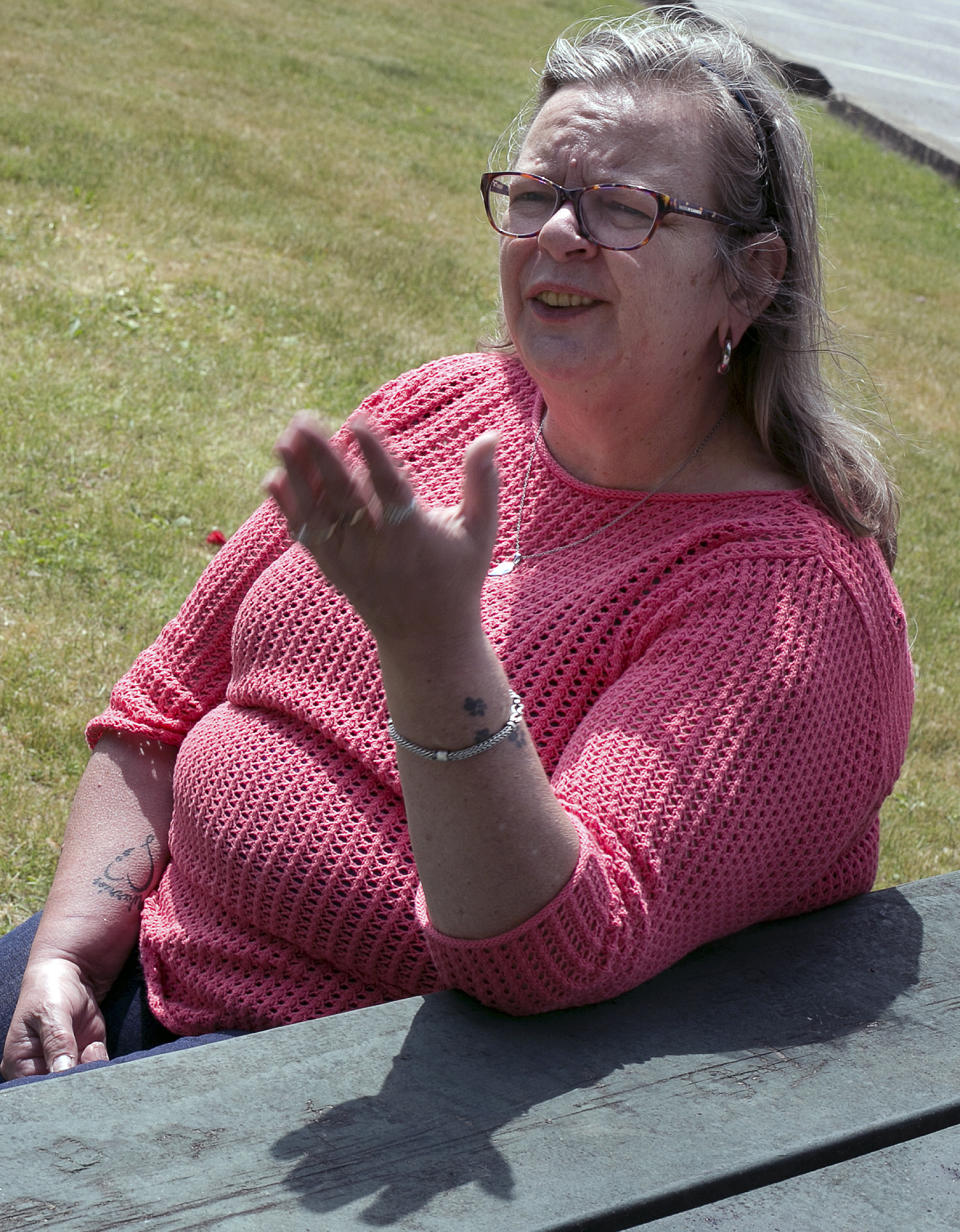 FILE - In this June 2, 2016 photo, Heidi Lilley speaks about her arrest the previous week, for going topless at Weirs Beach in Laconia, N.H. The Supreme Court is leaving in place the public nudity convictions of three women who removed their bathing suit tops on a New Hampshire beach as part of a campaign advocating for the rights of women to go topless. The justices declined Monday to review a state court decision that found no violation of the women's constitutional rights. (Geoff Forester/Concord Monitor via AP)