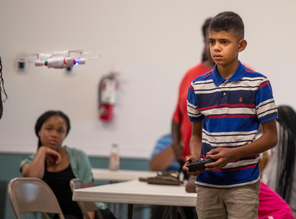 Caleb Compton practices his drone piloting skills Sept. 24 at Charity Chapel as part of a new Emmaus Kidz program.