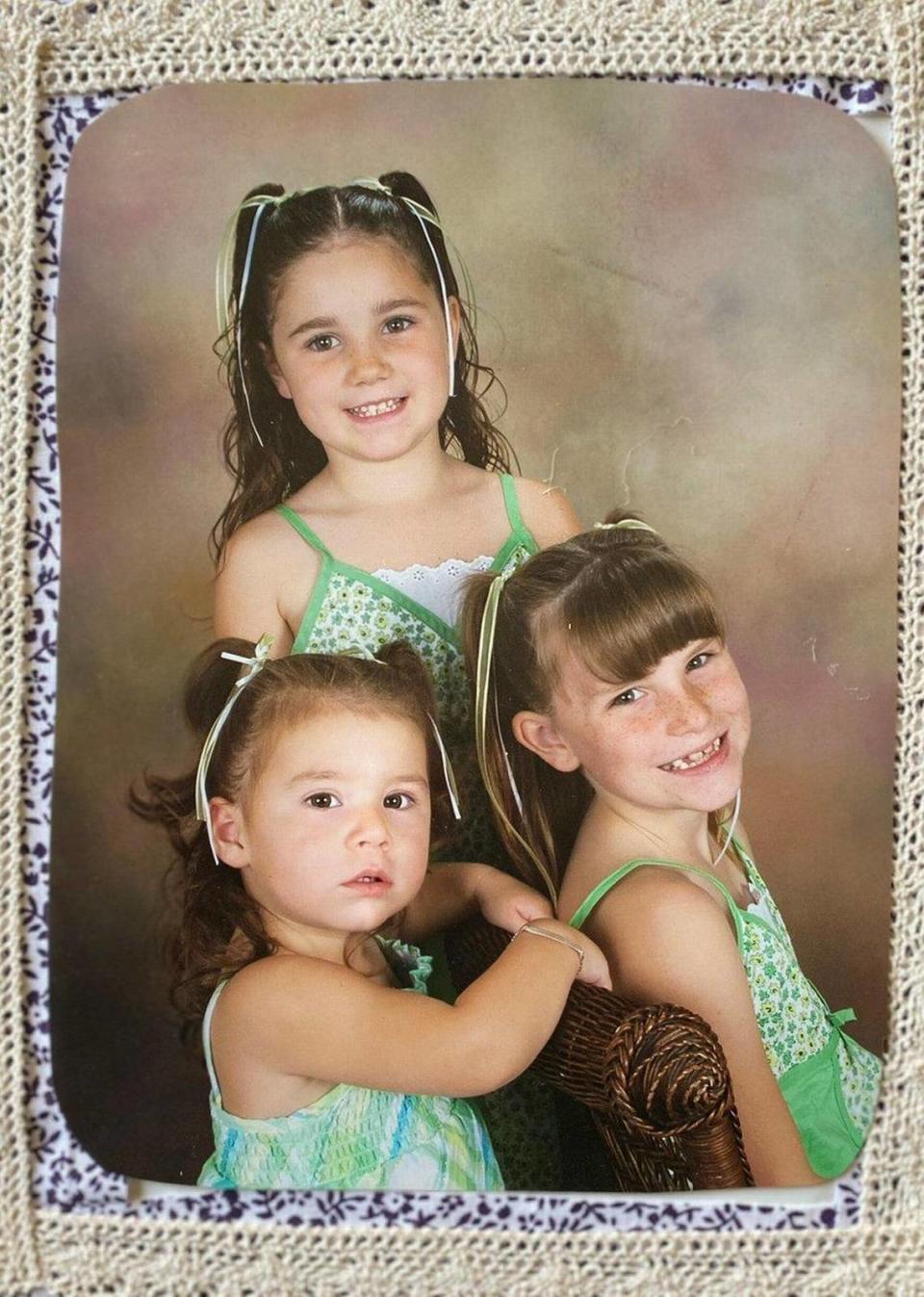 Kimberlee Booth’s daughters as children. Clockwise from back are Ashlynn Miles, Kaila Wright (seated, bangs) and Candyce Carrasco.