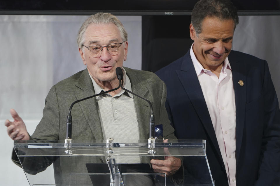 Robert De Niro speaks at the opening ceremony for the Tribeca Festival as New York Gov. Andrew Cuomo, right, listens, in New York on Wednesday, June 9, 2021. (Carlo Allegri/Pool via AP)