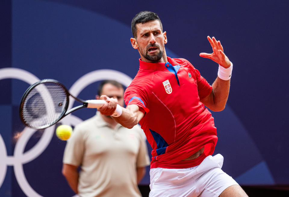 PARIS, FRANCE - AUGUST 04: Olympic champion and gold medal winner Novak Djokovic of Serbia in action while men′s single final on day nine of the Olympic Games Paris 2024 at Roland Garros on August 04, 2024 in Paris, France. (Photo by Markus Gilliar - GES Sportfoto/Getty Images)