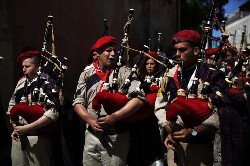 Israeli Arab Christian boy scouts play bagpipes during an Easter Monday parade in Tel Aviv