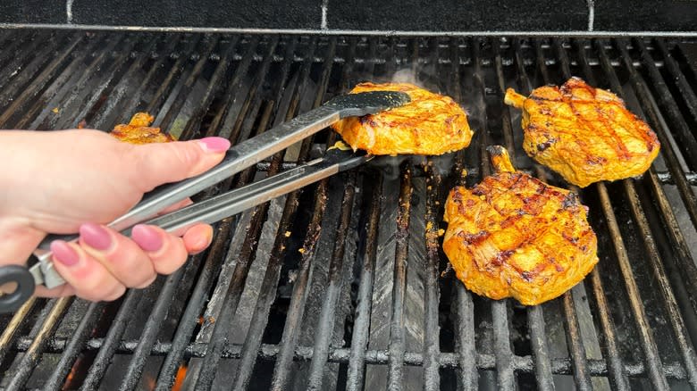 moving pork chops on grill