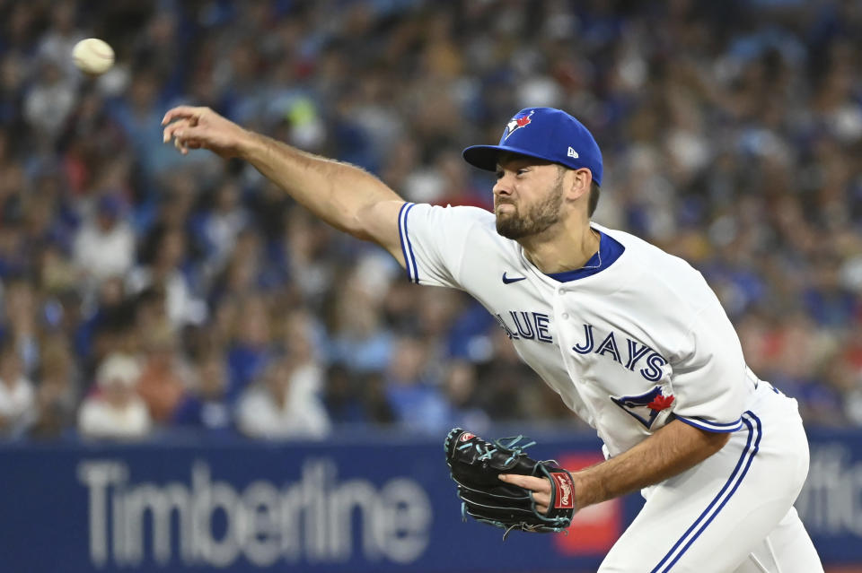 Toronto Blue Jays relief pitcher Zach Pop throws to a Cleveland Guardians batter during the fifth inning of a baseball game Friday, Aug. 12, 2022, in Toronto. (Jon Blacker/The Canadian Press via AP)