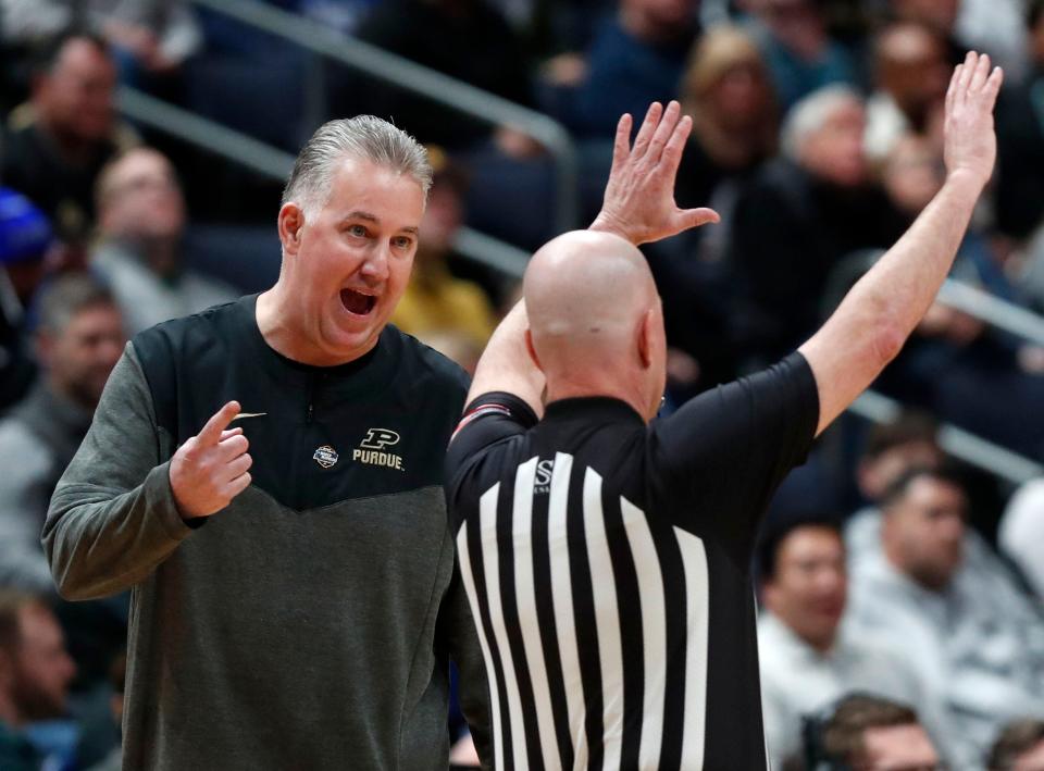 Purdue Boilermakers head coach Matt Painter talks to an official during the NCAA MenÕs Basketball Tournament game against the Fairleigh Dickinson Knights, Friday, March 17, 2023, at Nationwide Arena in Columbus, Ohio. 