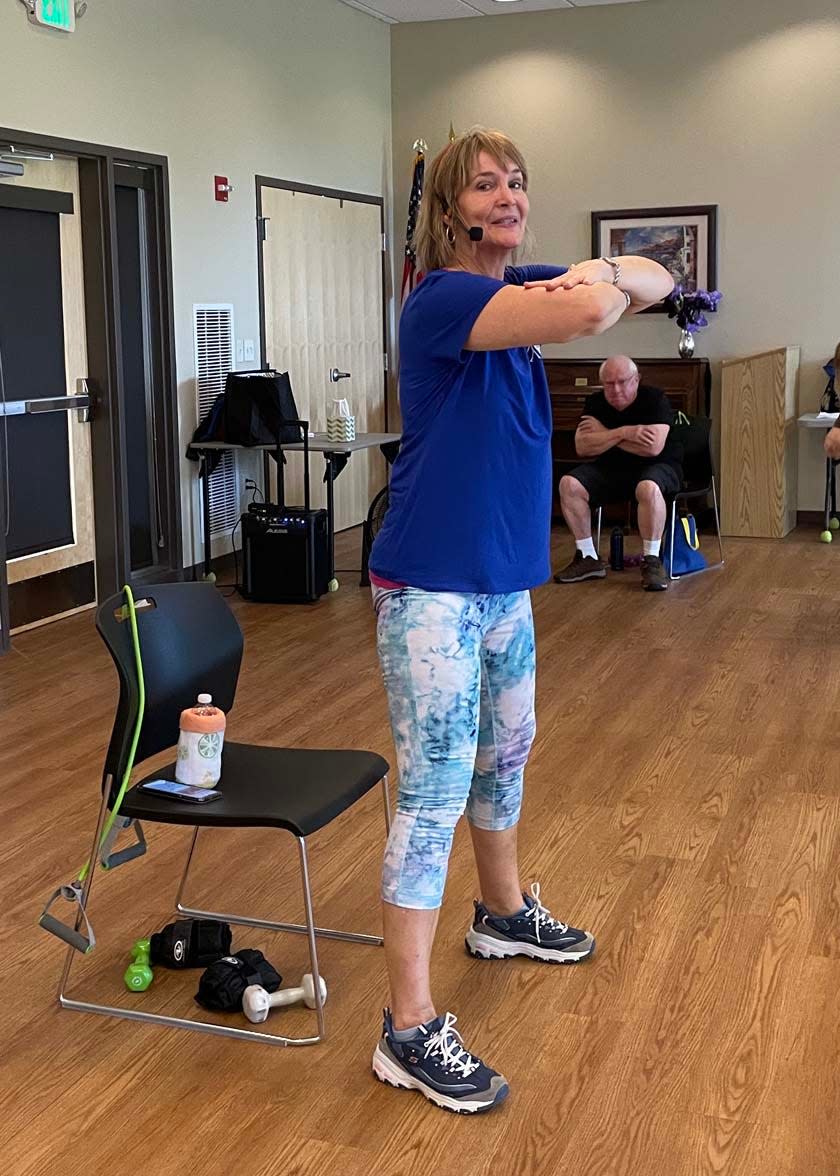 S.A.I.L. instructor Debbie Harris wears a bittersweet smile leading her last class at Karns Senior Center Wednesday, May 4, 2022.