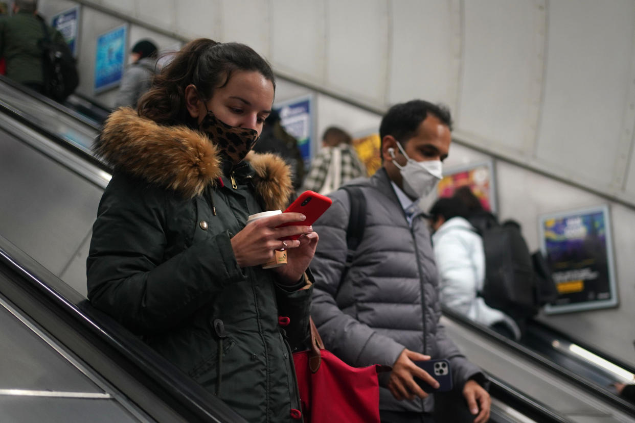 Commuters at Bond St underground station London, as all coronavirus laws in England including the legal requirement for people who test positive to isolate come to an end. Picture date: Thursday February 24, 2022.