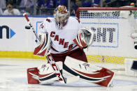 Carolina Hurricanes goaltender Antti Raanta makes a save against the New York Rangers during the first period of Game 3 of an NHL hockey Stanley Cup second-round playoff series, Sunday, May 22, 2022, in New York. (AP Photo/Adam Hunger)