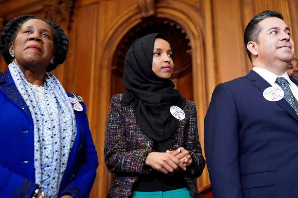 Rep. Ilhan Omar, D-Minn., joins  lawmakers to speak about the Voting Rights Enhancement Act on Feb. 26, 2019, in Washington,