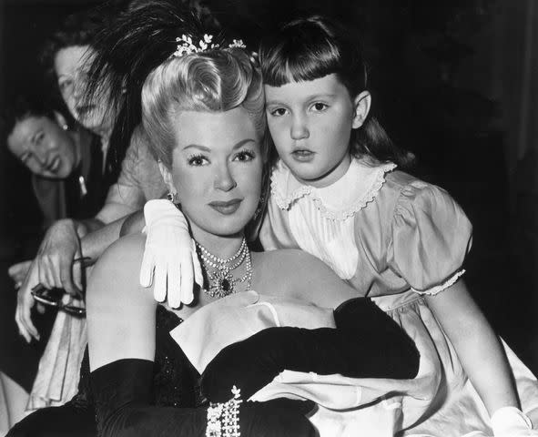 <p>Bob Beerman/Hulton Archive/Getty</p> Lana Turner (left) with daughter Cheryl Crane in 1952