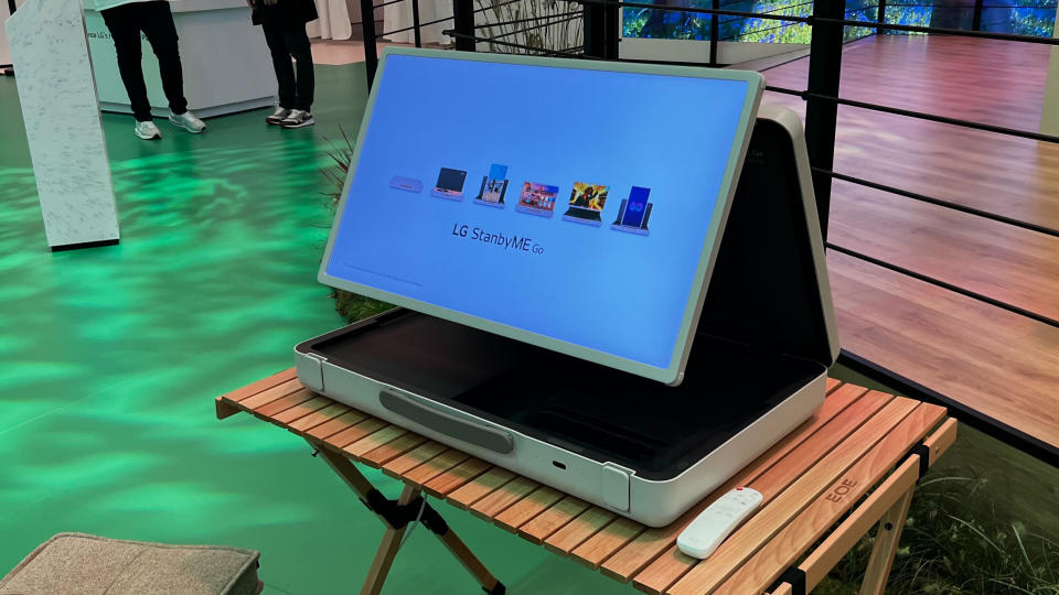 The LG StanbyME Go suitcase TV on a wooden table at the IFA 2023 trade show