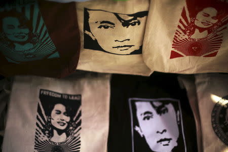 Bags with pictures of Aung San Suu Kyi are displayed in a shop in downtown Yangon April 3, 2015. REUTERS/Minzayar