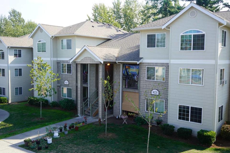 A view from a building at the Meadow Wood Townhomes shows other units in the complex occupied and decorated on Sept. 22, in Bellingham, Washington. Rachel Showalter/The Bellingham Herald