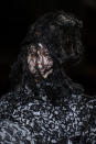 Oh the webs Comme weaves! The show, called “Ceremony of Separation,” brought grief and torturous pain to life with black headpieces seemingly made out of spider webs that completely obscured one’s view of the model’s face.