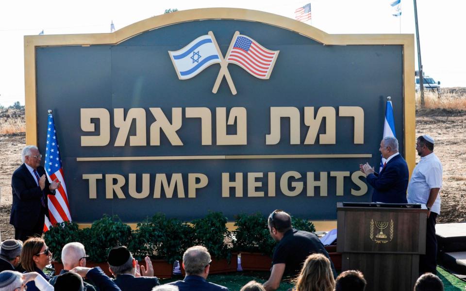 View of the sign of a Golan settlement named after Donald Trump - AFP/AFP