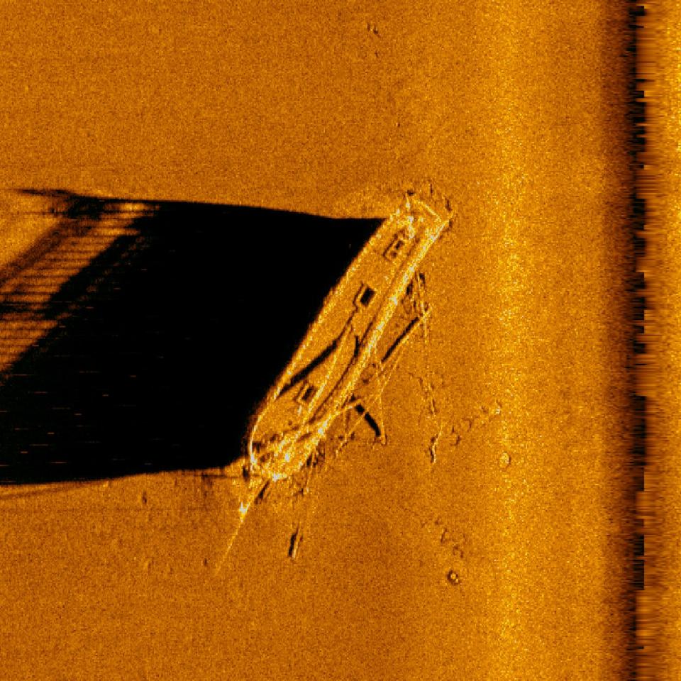 Sonar helps paint a picture of the bottom of the lake with sound. This sonar image shows the wreck of the schooner Gallinipper, which sank off the coast of Centerville in Manitowoc County in 1851. The Gallinipper is Wisconsin's oldest known shipwreck and sits within the boundaries of the Wisconsin Shipwreck Coast National Marine Sanctuary.