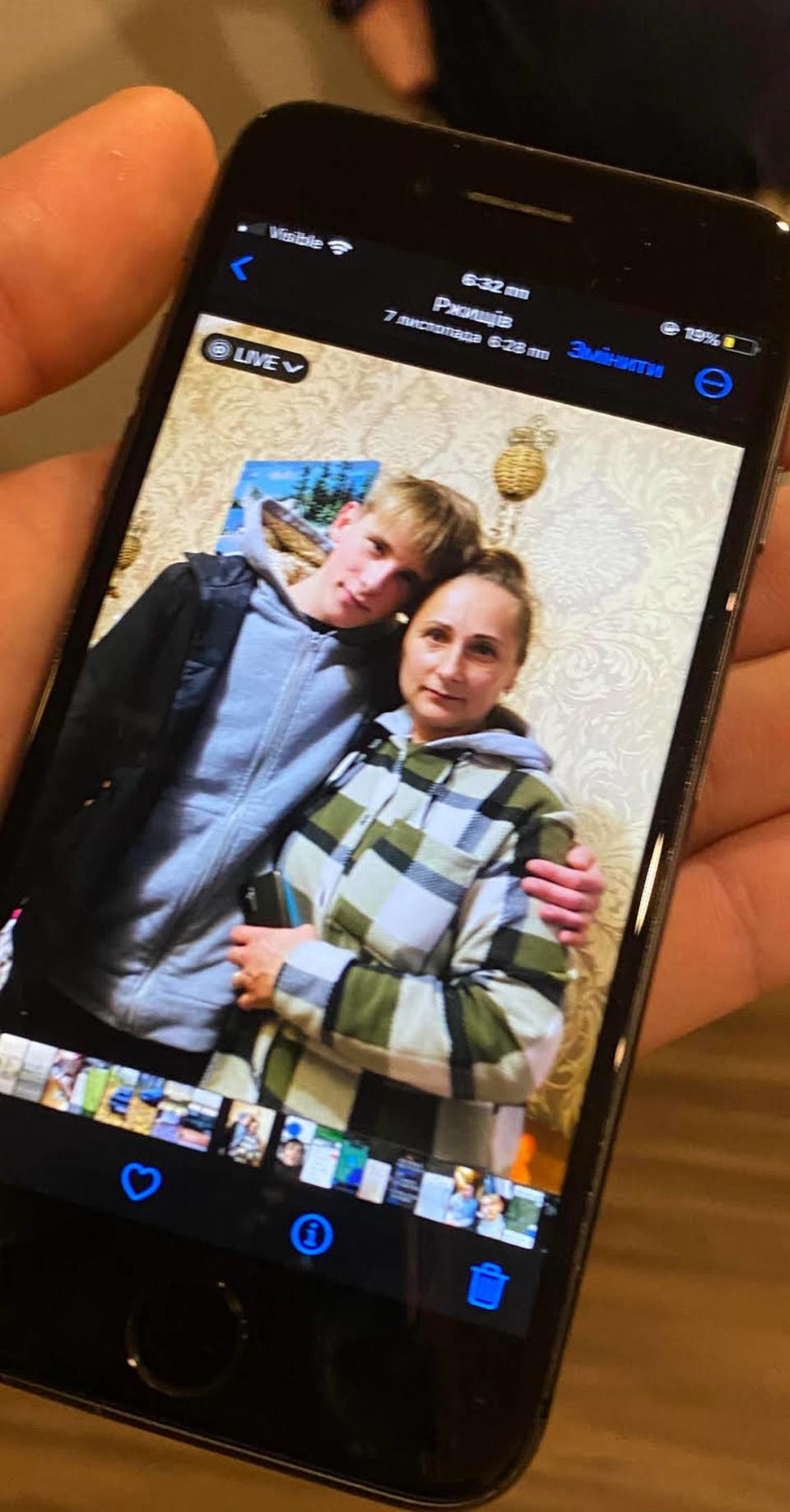 Vlad Horokhov shows a picture of his mother, who lives under constant drone attack in the Ukrainian city Rzhyschiv. Horokhov, 20, came to Raleigh two weeks ago fleeing the war at home, staying with a Russian political refugee.