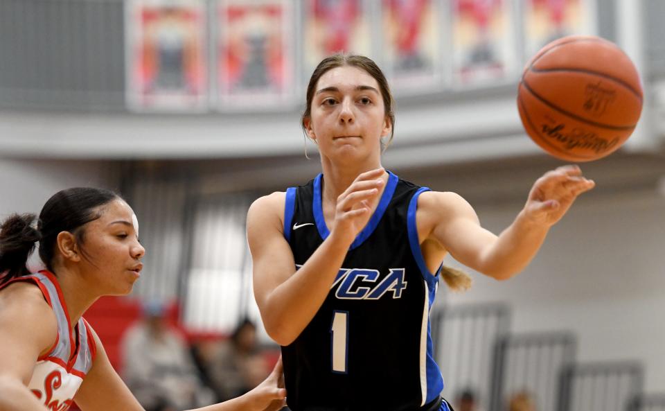 CVCA senior guard Gia Casalinova, right, passes the ball against a Canton South defender on Saturday, Feb. 4, 2023.