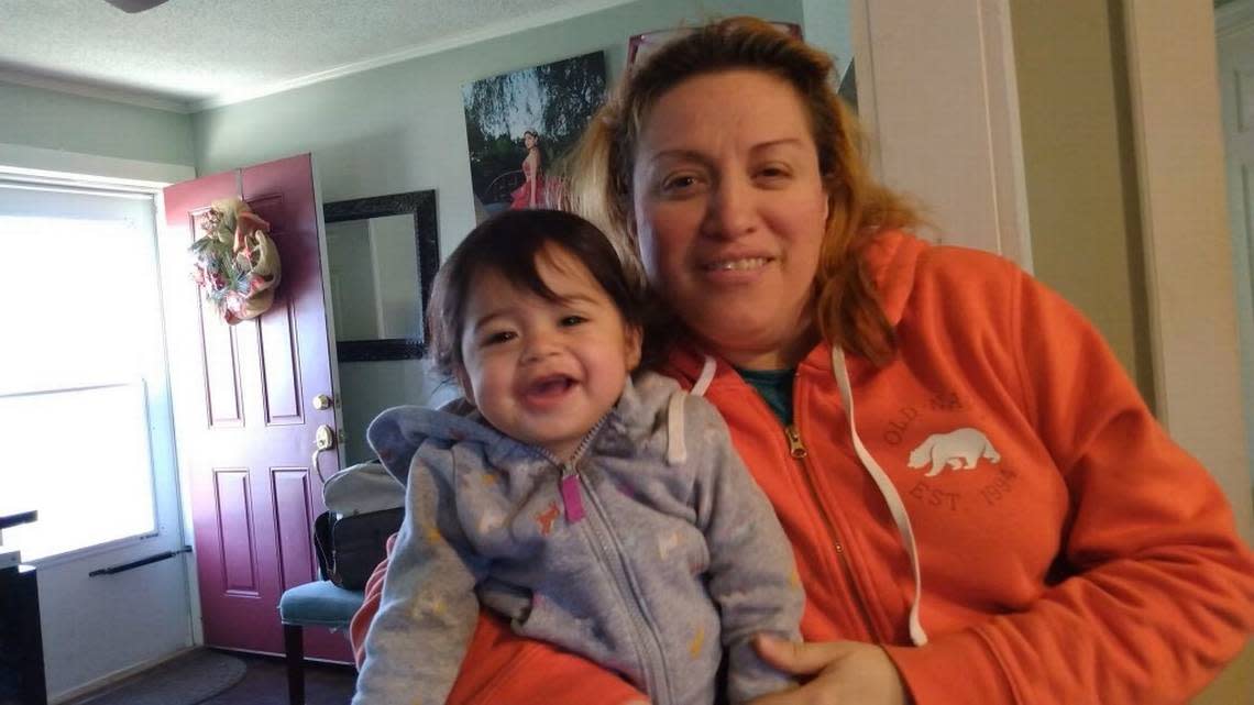 Stephanie Perez (right), 46, of Kansas City, Kansas, is pictured with her niece in a photograph provided by her family. Perez was severely injured in a knife attack carried out by a man police say killed his relative in a senior living apartment on Tuesday and also charged police officers with a knife.