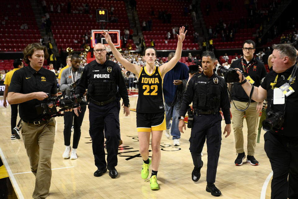 Iowa guard Caitlin Clark (22) walks off the court after an NCAA college basketball game against Maryland, Saturday, Feb. 3, 2024, in College Park, Md. (AP Photo/Nick Wass)