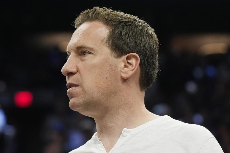 Phoenix Suns owner Mat Ishbia watches players warm up prior to Game 4 of an NBA basketball first-round playoff series against the Minnesota Timberwolves, Sunday, April 28, 2024, in Phoenix. The Timberwolves won 122-116, taking the series 4-0. (AP Photo/Ross D. Franklin)