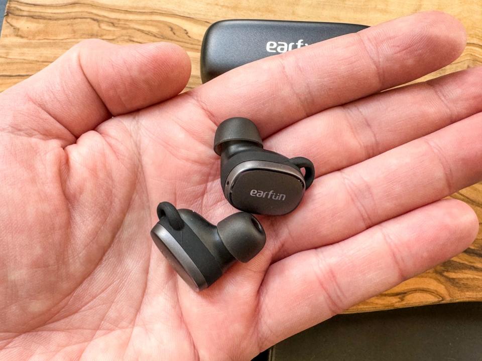 earfun free pro 3 wireless earbuds in hand