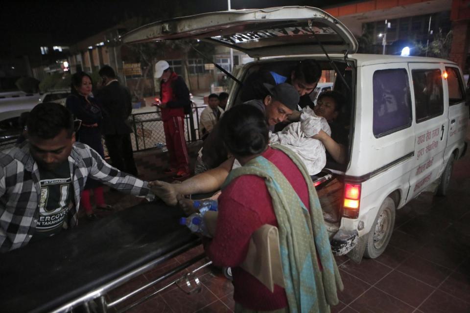 In this March 1, 2017, photo, a patient is brought to the Teaching Hospital in a ambulance in Kathmandu, Nepal. Nepal is woefully short of ambulances and trained emergency medical technicians who can man them.Now a group of doctors from Stanford University are training four dozen Emergency Medical Technicians in the hope that they can gradually transform the Himalayan nations emergency services. (AP Photo/Niranjan Shrestha)