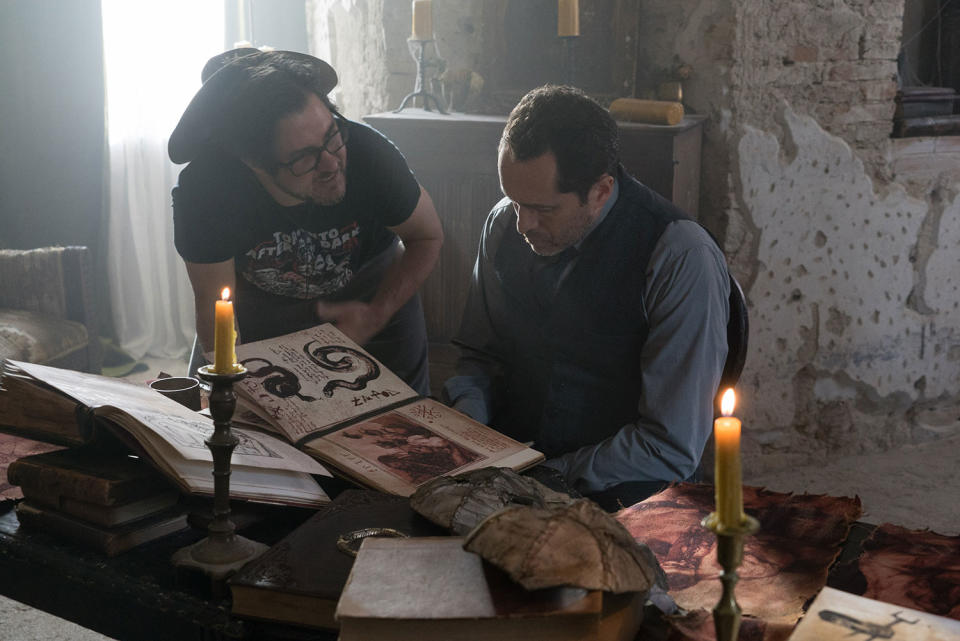 (L-R) Director Corin Hardy and Demian Bichir on the set of New Line Cinema’s horror film <i>The Nun</i> a Warner Bros. Pictures release. (© 2018 WARNER BROS. ENTERTAINMENT INC.)