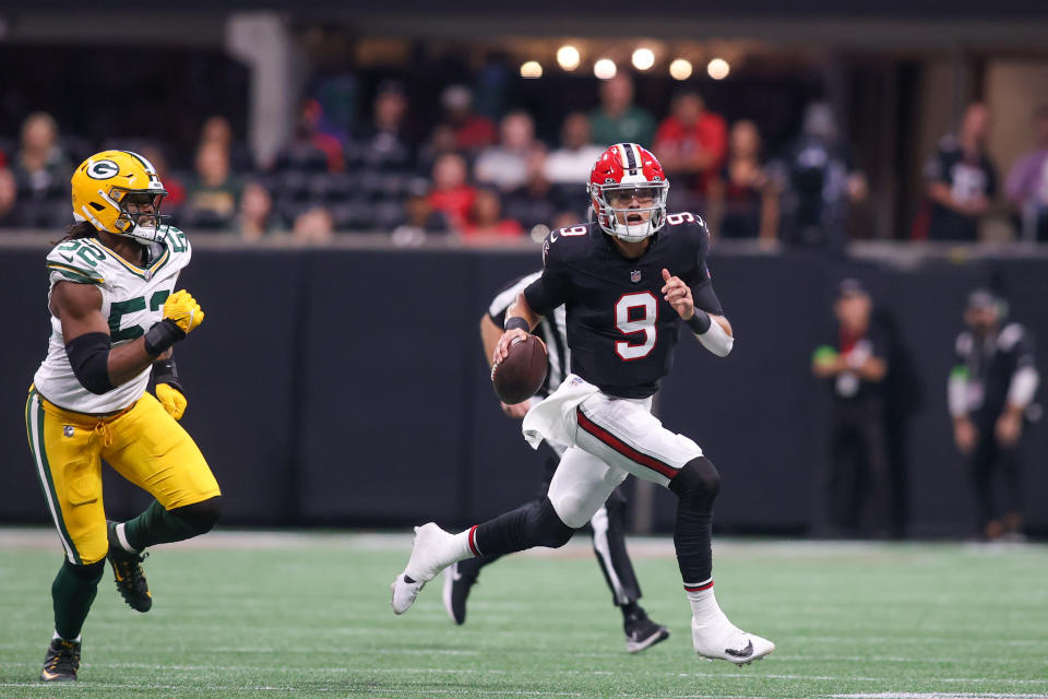 Sep 17, 2023; Atlanta, Georgia, USA; Atlanta Falcons quarterback Desmond Ridder (9) scrambles against the Green Bay Packers in the second quarter at Mercedes-Benz Stadium. Mandatory Credit: Brett Davis-USA TODAY Sports