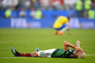 <p>Miguel Layun of Mexico shows his dejection following the 2018 FIFA World Cup Russia Round of 16 match between Brazil and Mexico at Samara Arena on July 2, 2018 in Samara, Russia. (Photo by Matthias Hangst/Getty Images) </p>