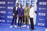 From left, brothers Kostas, Alex, Giannis and Thanasis Antetokounmpo pose together at the premiere of the Disney+ film "Rise," Wednesday, June 22, 2022, at Walt Disney Studios in Burbank, Calif. The film is based on the story of the Antetokounmpo family, who emigrated from Nigeria to Greece before Giannis, Kostas and Thanasis found success in the National Basketball Association. (AP Photo/Chris Pizzello)