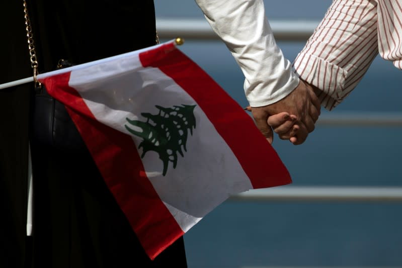 Demonstrators form a human chain during ongoing anti-government protests