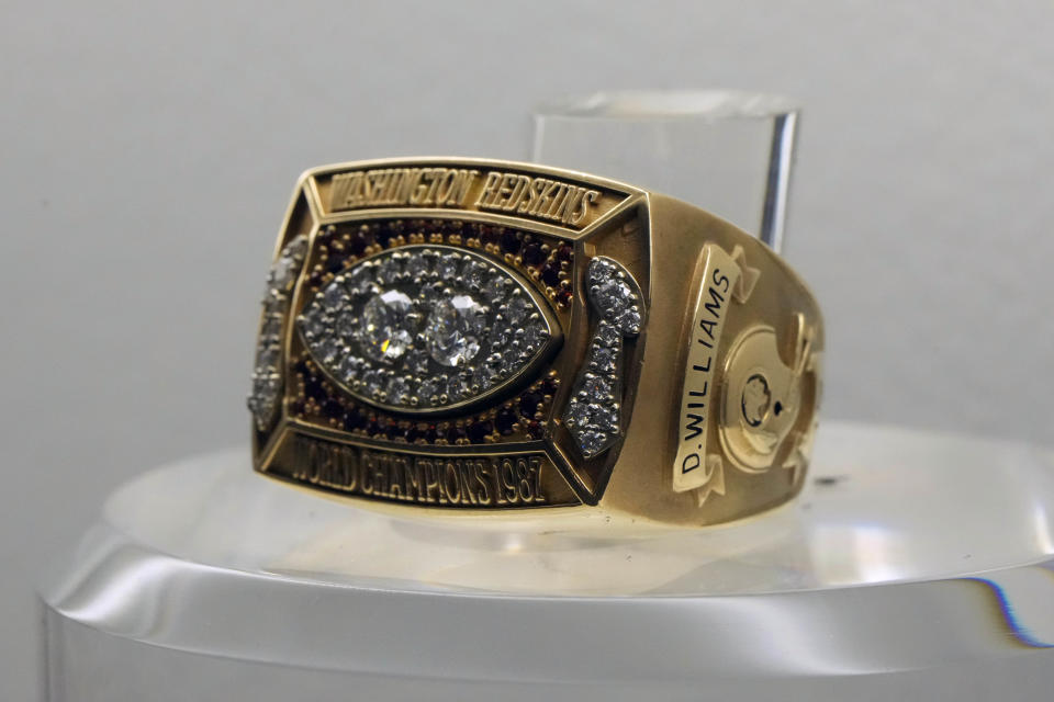 Feb 11, 2023; Phoenix, AZ, USA; The Super Bowl XXII ring to commemorate the Washington Redskins victory over the <a class="link " href="https://sports.yahoo.com/nfl/teams/denver/" data-i13n="sec:content-canvas;subsec:anchor_text;elm:context_link" data-ylk="slk:Denver Broncos;sec:content-canvas;subsec:anchor_text;elm:context_link;itc:0">Denver Broncos</a> in Super Bowl XXII at Jack Murphy Stadium in San Diego on Jan. 31, 1988. Mandatory Credit: Kirby Lee-USA TODAY Sports