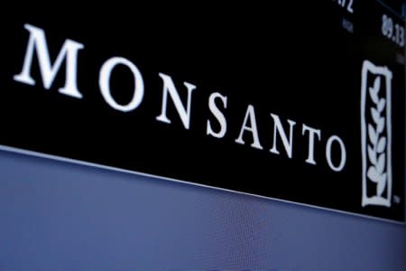 FILE PHOTO: Monsanto logo is displayed on a screen where the stock is traded on the floor of the New York Stock Exchange (NYSE) in New York City, U.S. on May 9, 2016. REUTERS/Brendan McDermid/File Photo