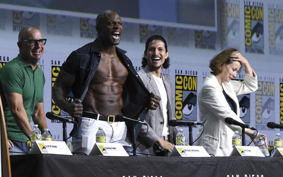 Michael Satrazemis, from left,Terry Crews, Danny Ramirez and Samantha Morton participate in a panel for "Tales of the Walking Dead" on day two of Comic-Con International on Friday, July 22, 2022, in San Diego. (Photo by Richard Shotwell/Invision/AP)